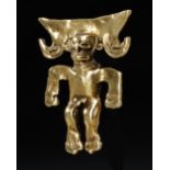 A PRE COLOMBIAN GOLD FIGURE, CIRCA 800-1200 A.D