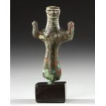 AN ELAMITE BRONZE FEMALE FIGURE, CIRCA 2ND MILLENNIUM B.C.