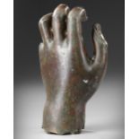 A ROMAN BRONZE FEMALE LEFT HAND, CIRCA 1ST CENTURY A.D.