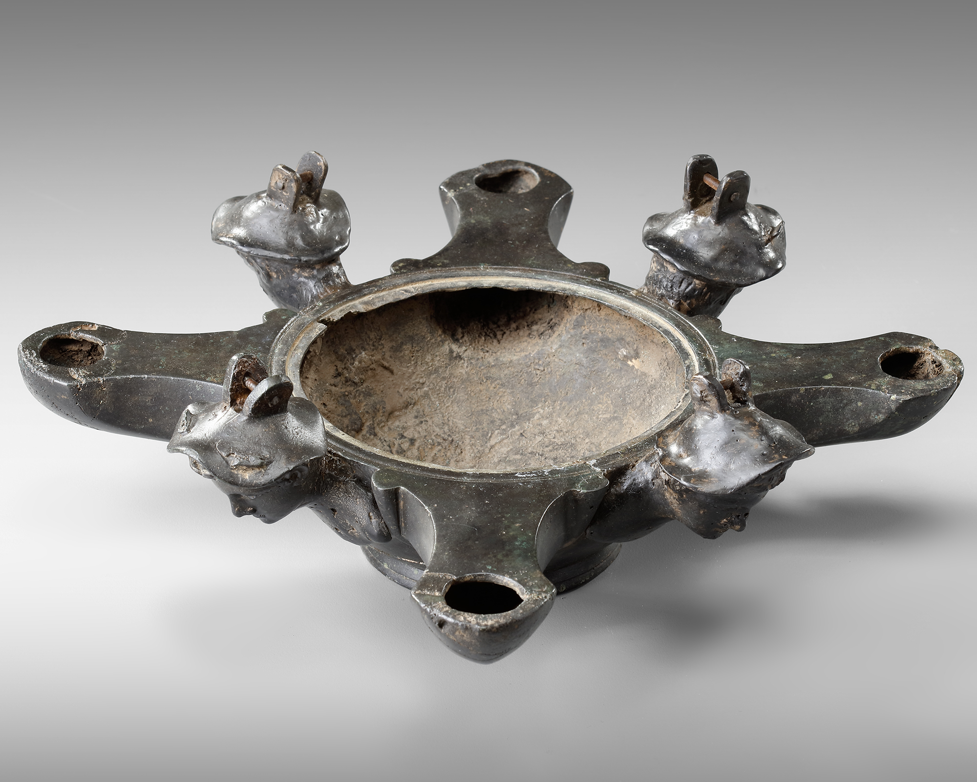 A ROMAN BRONZE OIL LAMP WITH FOUR SPOUTS AND BUSTS OF MERCURY, CIRCA 1ST-2ND CENTURY A.D - Image 2 of 5