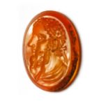 A ROMAN CARNELIAN INTAGLIO BUST OF EMPEROR, CIRCA 2ND-3RD CENTURY A.D.