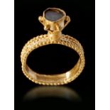 A BYZANTINE GOLD BEZEL FINGER RING, CIRCA 5TH-6TH CENTURY A.D.