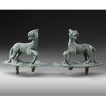 A PAIR OF ROMAN BRONZE CHARIOT FITTINGS WITH FEMALE PANTHER, CIRCA 2ND-3RD CENTURY A.D.