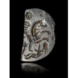 A ROMAN HAEMATITE MAGICAL INTAGLIO, CIRCA 3TH-4TH CENTURY A.D.