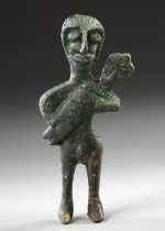 A WESTERN ASIATIC BRONZE MOTHER AND BABY, CIRCA LATE 2ND MILLENNIUM B.C.