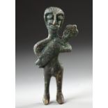 A WESTERN ASIATIC BRONZE MOTHER AND BABY, CIRCA LATE 2ND MILLENNIUM B.C.