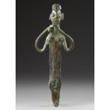 AN ELAMITE BRONZE IDOL, CIRCA 2ND MILLENNIUM B.C.