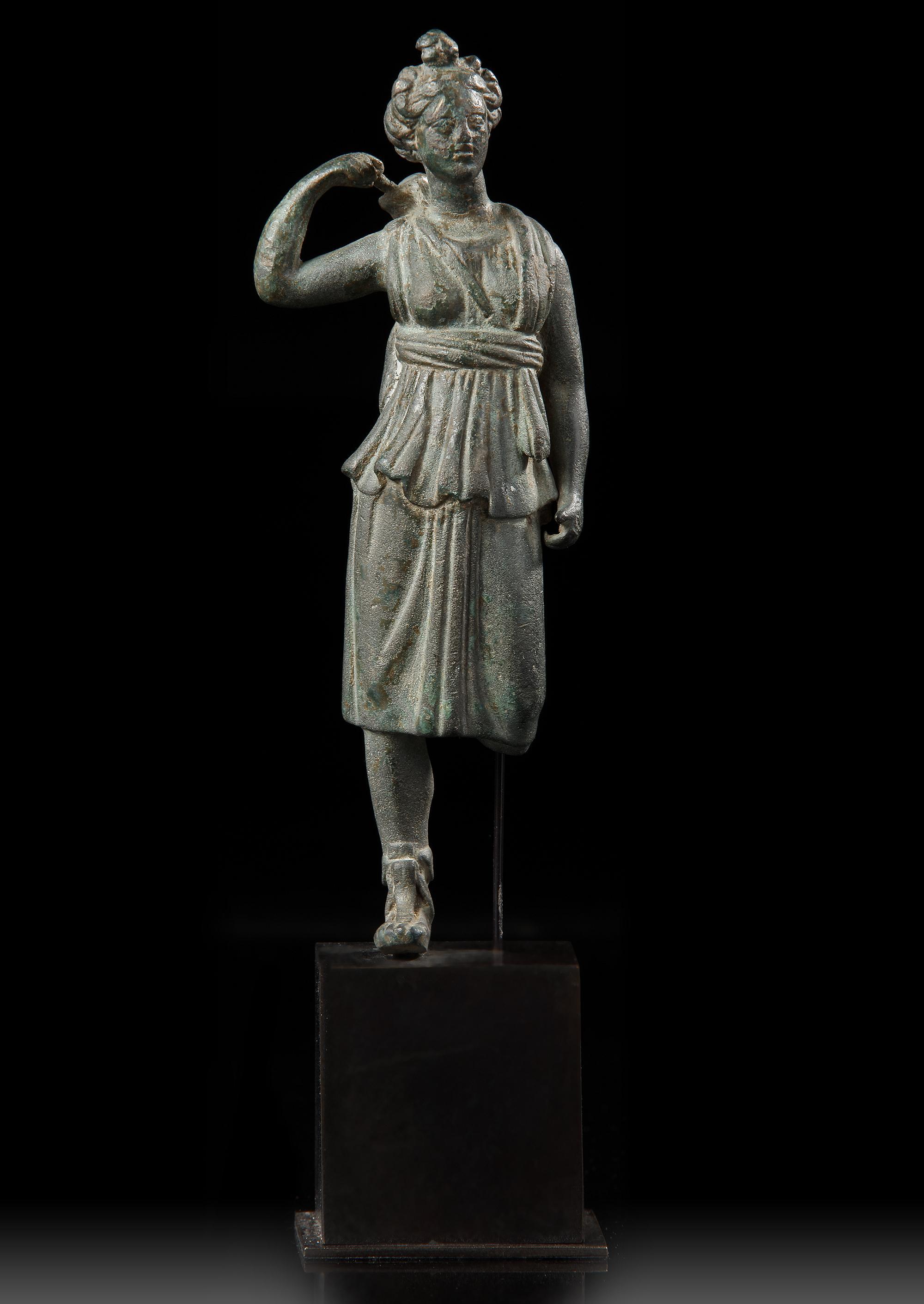 A ROMAN BRONZE STATUETTE OF DIANA, CIRCA 1ST-2ND CENTURY A.D.