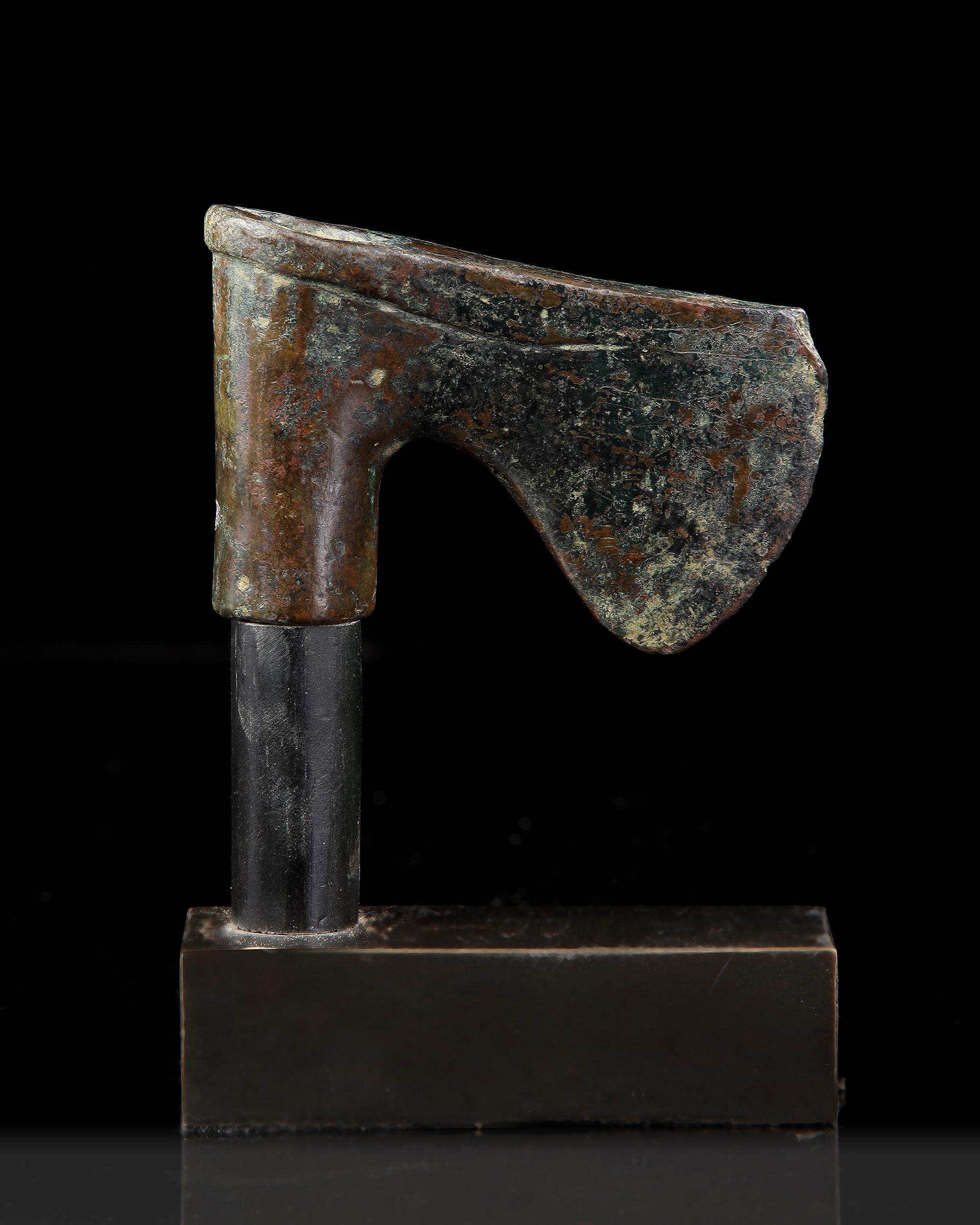 A GROUP OF WESTERN ASIATIC BRONZE AXE HEADS, CIRCA 3RD-2ND MILLENNIUM B.C. - Image 4 of 6