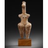 AN AMLASH TERRACOTTA STEATOPHYGOUS FIGURE, CIRCA EARLY 1ST CENTURY B.C.