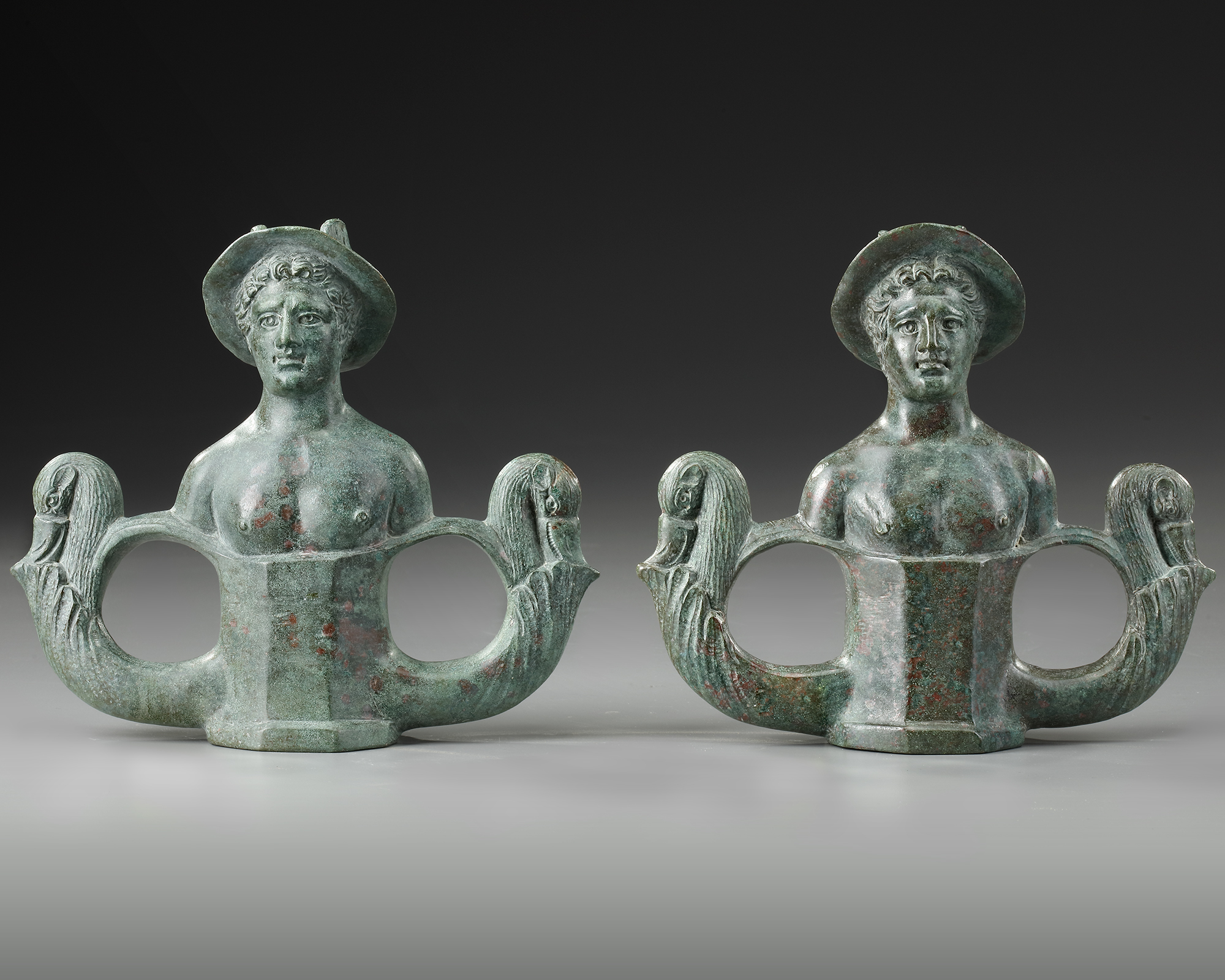 A PAIR OF ROMAN BRONZE CHARIOT FITTING, CIRCA 1ST- 2ND CENTURY A.D.