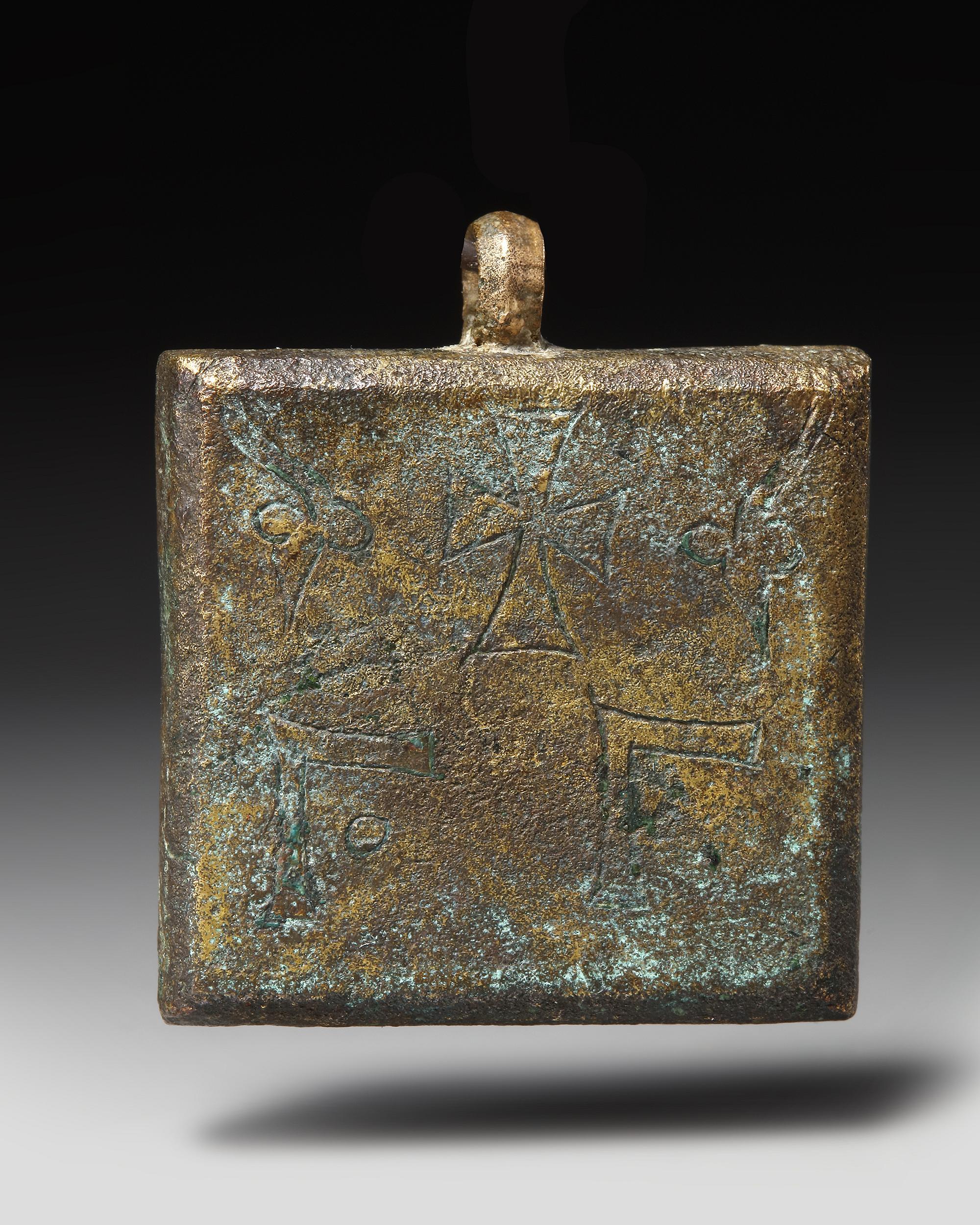 A BYZANTINE BRONZE WEIGHT, CIRCA 6TH-7TH CENTURY A.D.