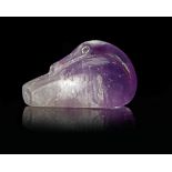 A WESTERN ASIATIC AMETHYST DUCK WEIGHT, CIRCA 2ND-1ST CENTURY B.C.