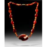 A WESTERN ASIATIC CARNELIAN NECKLACE, CIRCA 2ND CENTURY B.C.