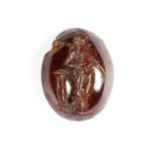 A ROMAN GARNET INTAGLIO OF STANDING APOLLO, CIRCA 2ND-3RD CENTURY A.D.