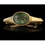 A ROMAN GOLD RING WITH INTAGLIO, CIRCA 1ST- 2ND CENTURY A.D.