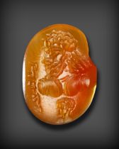 A SASSANIAN CARNELIAN STAMP SEAL WITH PORTRAIT BUST OF A MAN, CIRCA 6TH CENTURY A.D.