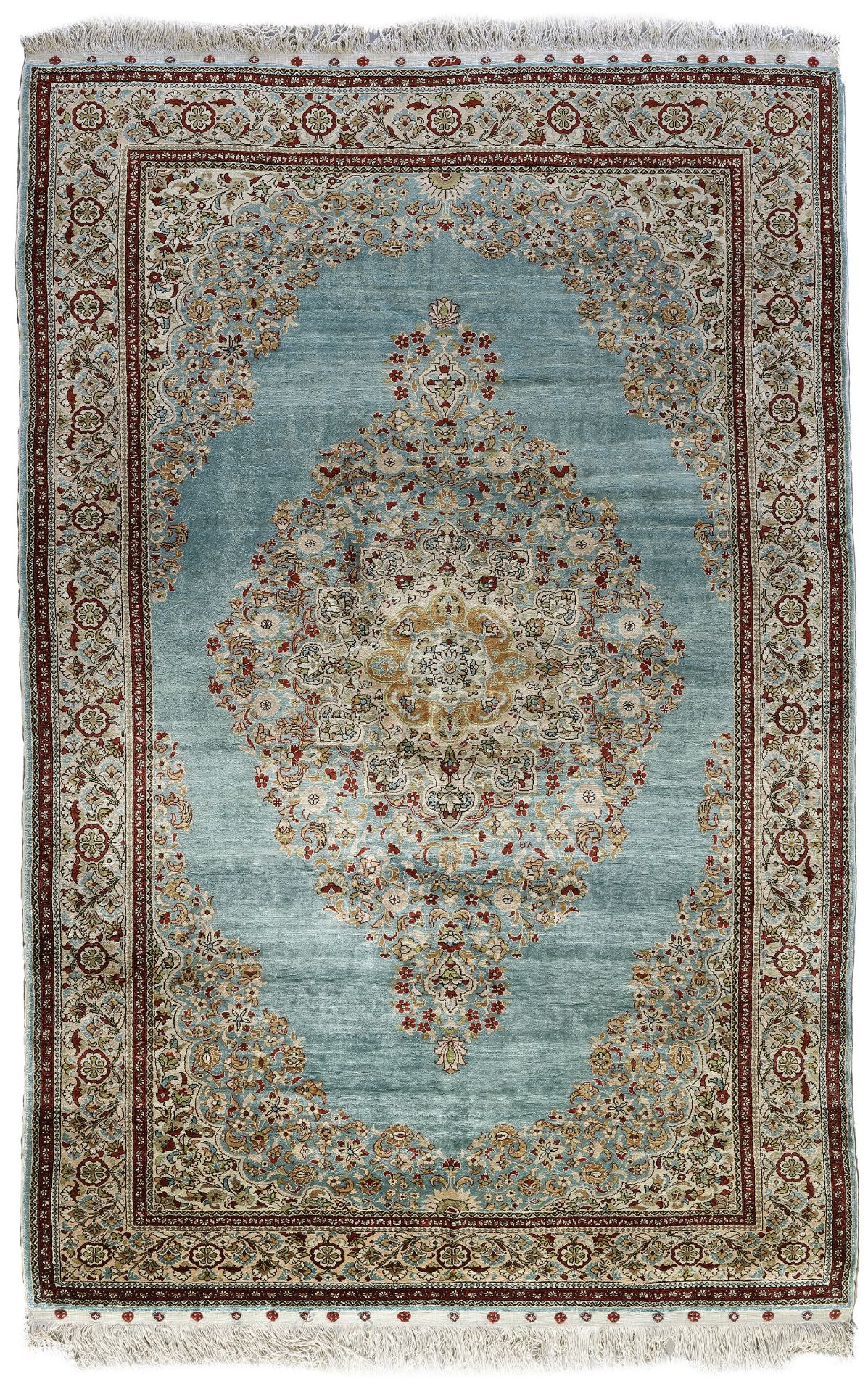 A SIGNED SILK TURKISH HEREKE RUG, 1950