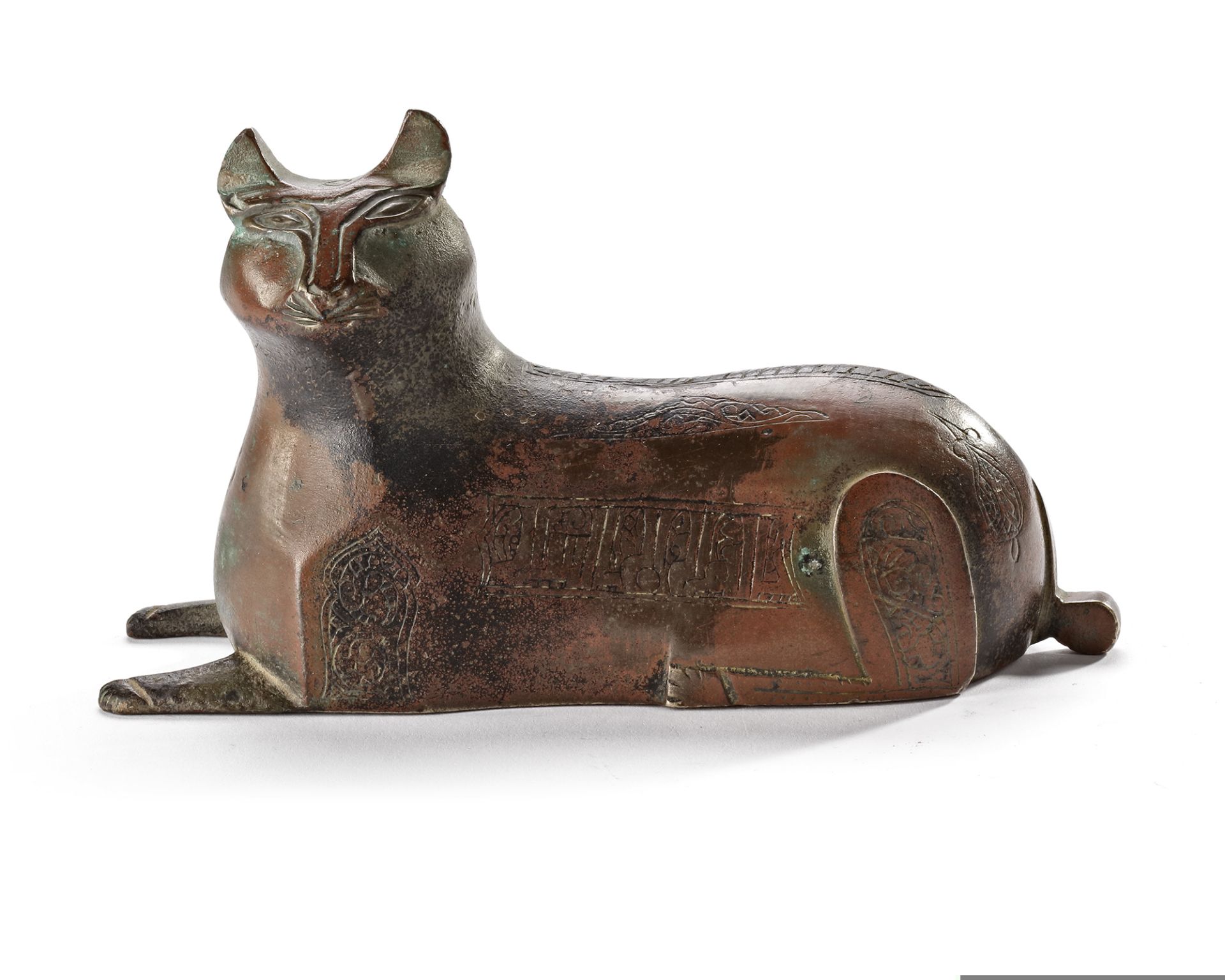 A KHORASAN BRONZE WEIGHT FIGURINE IN THE FORM OF A LION, PERSIA, 12TH CENTURY