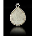 A MUGHAL JADE PENDANT (HALDILI) MUGHAL INDIA, DATED 1013 AH/1607 AD