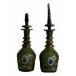 Pair of Persian emerald-colored glass bottles