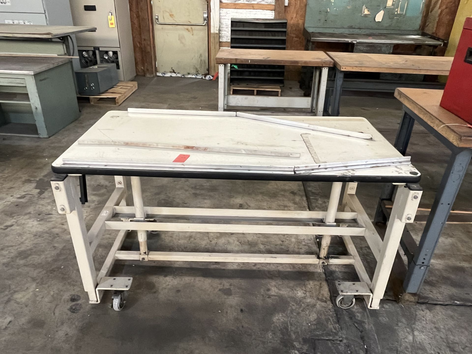 Adjustable Height Rolling Work Table