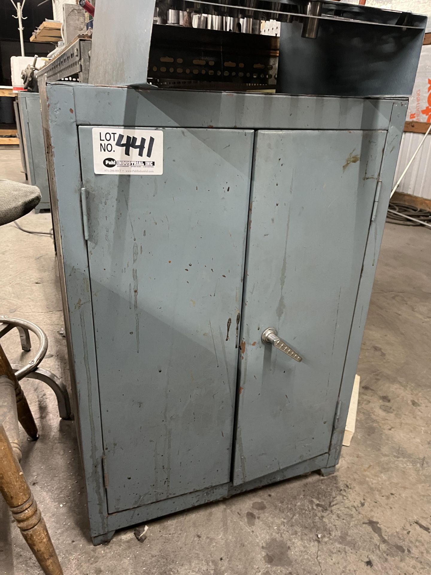 24" X 15" X 33" tall steel cabinet w/contents