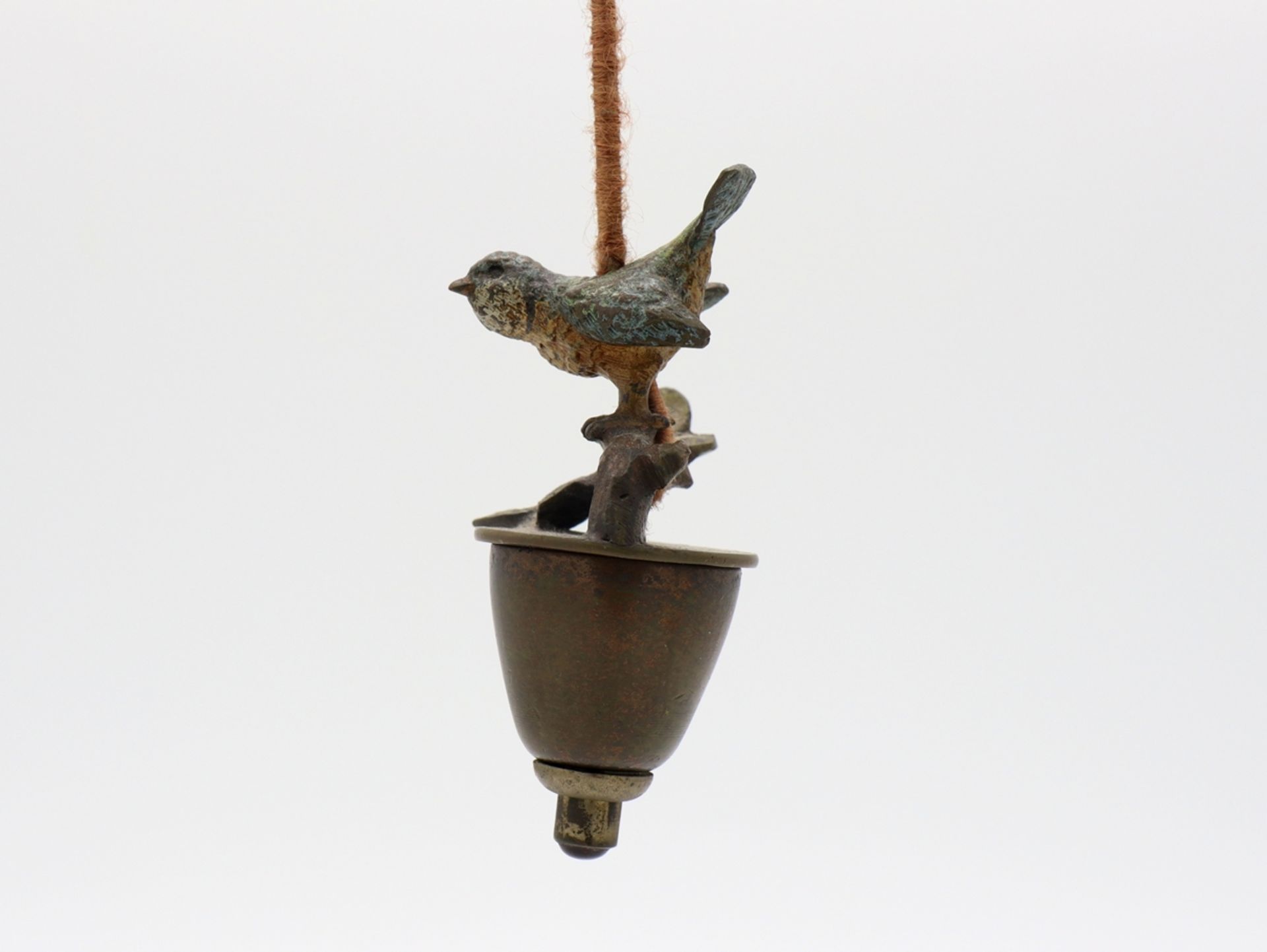Table bell bronze bird, around 1900.