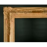 20th Century English School. A Gilt Composition Frame, with swept centres and corners, rebate 24"