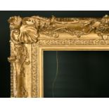 19th Century English School. A Gilt Composition Frame, with swept centres and corners, rebate 26.