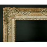 20th Century English School. A Gilt and Painted Composition Frame, with swept centres and corners,