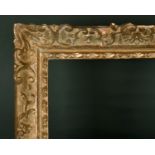 20th Century English School. A Carved Giltwood Frame, with swept centres and corners, rebate 25.