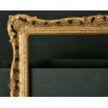 20th Century English School. A Gilt Composition Frame, swept and pierced, rebate 21" x 14" (53.3 x