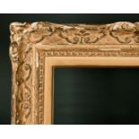 20th Century French School. A Carved Giltwood and Painted, with swept centres and corners, rebate