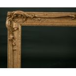 20th Century English School. A Gilt Composition Frame, with Swept and Pierced Centres and Corners,