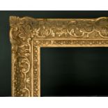 20th Century English School. A Gilt Composition Frame, with swept centres and corners, rebate 22"