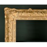 20th Century English School. A Gilt Composition Frame, with swept centres and corners, rebate 23"