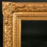 20th Century European School. A Gilt Composition Frame, with swept and pierced centres and