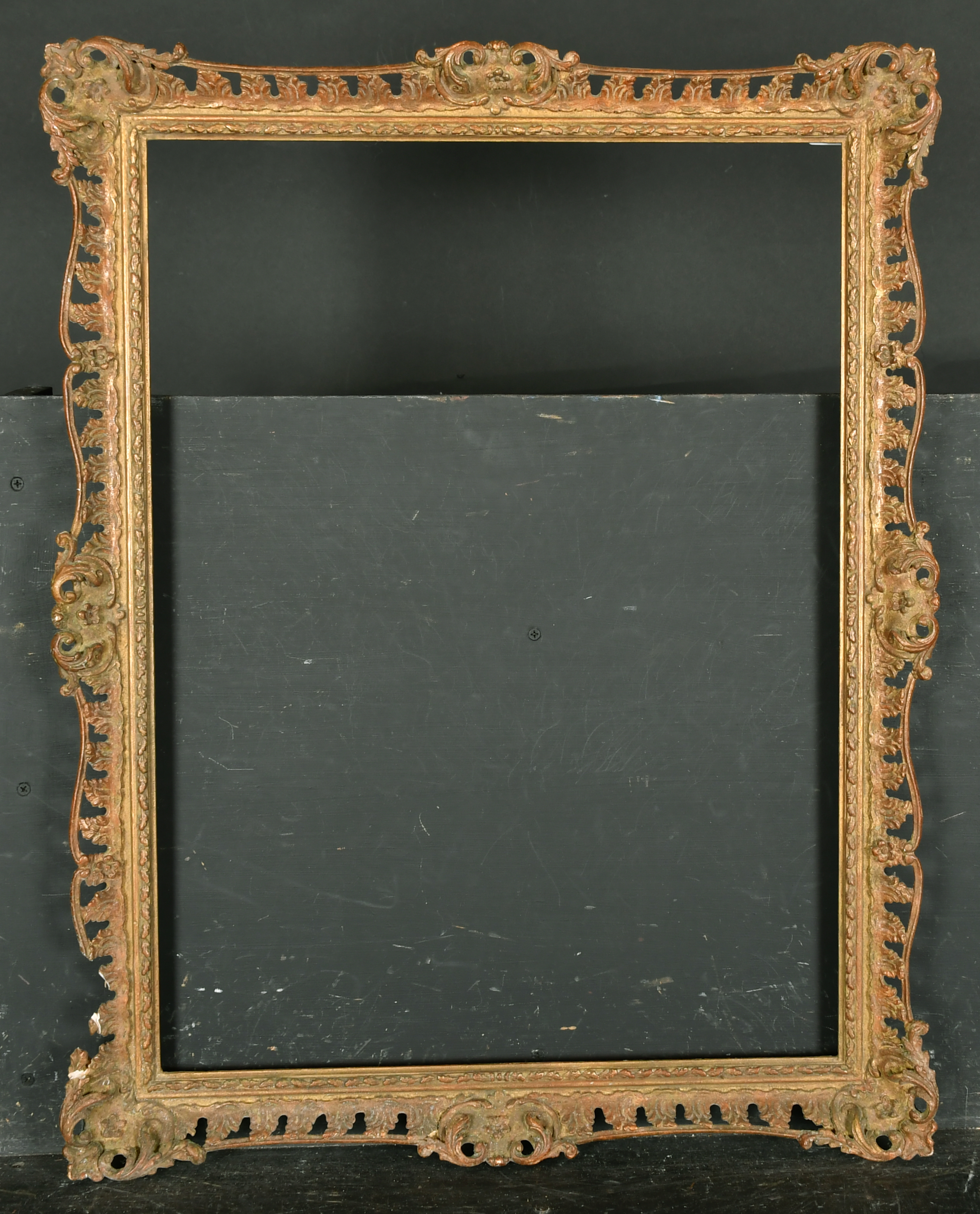 20th Century English School. A Gilt Composition frame with swept and pierced centres and corners, - Image 2 of 3