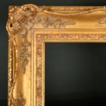 20th Century English School. A Gilt Composition frame with swept and pierced centres and corners,