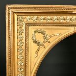 19th Century French School. A Gilt Composition Frame, with an oval slip, rebate 24" x 20" (61 x 50.