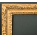 17th Century English School. A Carved Giltwood Finger Panel Frame, circa 1680, rebate 30" x 25" (