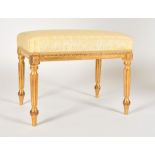 Alexander G Ley & Son. A Reproduction Adam Style Gilded Stool, upholstered in cream, 17.5" high (