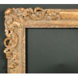 17th Century French School. A Louis XIV Carved Giltwood Frame, with swept and pierced corners, circa