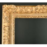 17th Century French School. A Louis XIV Carved Giltwood Frame, with swept centres and corners, circa