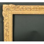 Alexander G Ley & Son. A Reproduction Carved English Giltwood Frame, with corner runner, rebate