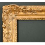 18th Century English School. A Carved Giltwood Frame, with swept corners, circa 1740, rebate 31" x