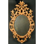 Alexander G Ley & Son. A Reproduction Carved Giltwood Chippendale Style Mirror, Oval 38.5" x 22" (
