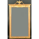 Alexander G Ley & Son. A Reproduction Adam Style Carved Giltwood and Ornamented Mirror, 55.5" x