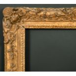 18th Century English School. A Carved Giltwood Frame, with swept and pierced centres and corners,